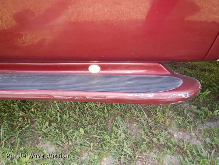 image for item DG4824 2004 Ford F150 Lariat SuperCrew flatbed pickup truck