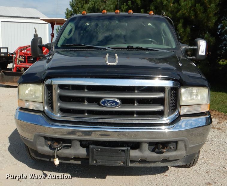 image for item DG4830 2004 Ford F350 Super Duty XLT flatbed pickup truck