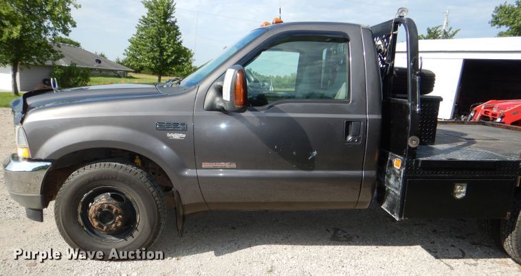 image for item DG4830 2004 Ford F350 Super Duty XLT flatbed pickup truck