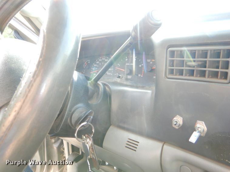 image for item DG4830 2004 Ford F350 Super Duty XLT flatbed pickup truck