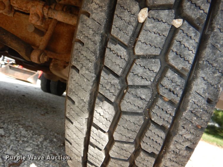 image for item DG4830 2004 Ford F350 Super Duty XLT flatbed pickup truck