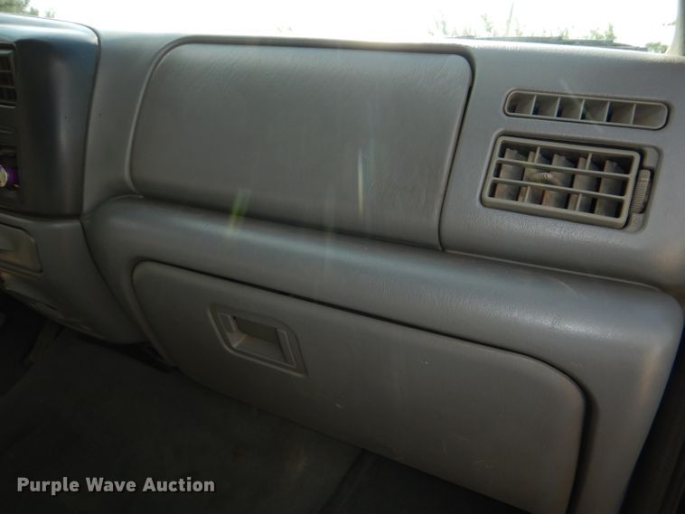 image for item DG4830 2004 Ford F350 Super Duty XLT flatbed pickup truck