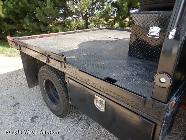 image for item DG4830 2004 Ford F350 Super Duty XLT flatbed pickup truck