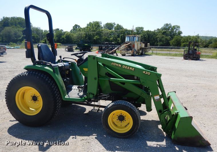 image for item DH0302 2003 John Deere 4410 MFWD tractor