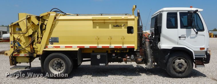 image for item DI1750 2010 UD Nissan UD2300 refuse truck