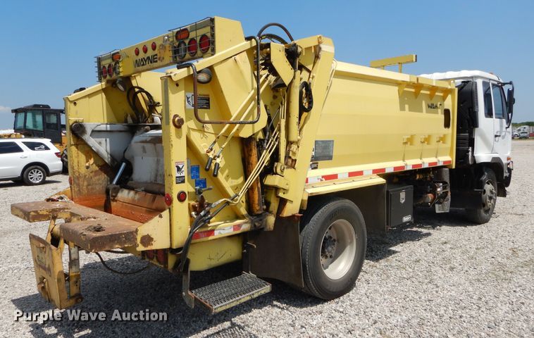 image for item DI1750 2010 UD Nissan UD2300 refuse truck