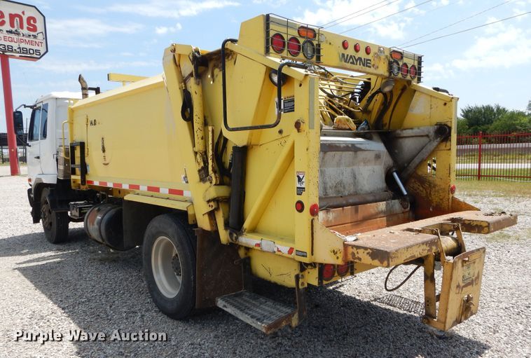 image for item DI1750 2010 UD Nissan UD2300 refuse truck
