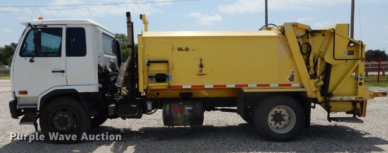 image for item DI1750 2010 UD Nissan UD2300 refuse truck
