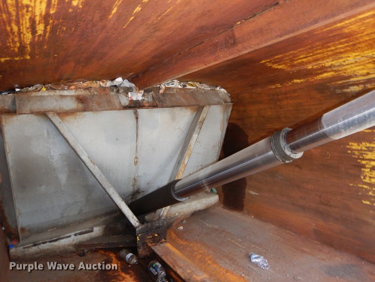 image for item DI1750 2010 UD Nissan UD2300 refuse truck