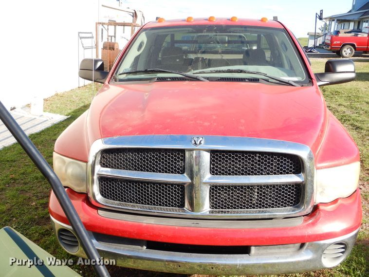 image for item FI9929 2003 Dodge Ram 2500 Quad Cab flatbed pickup truck