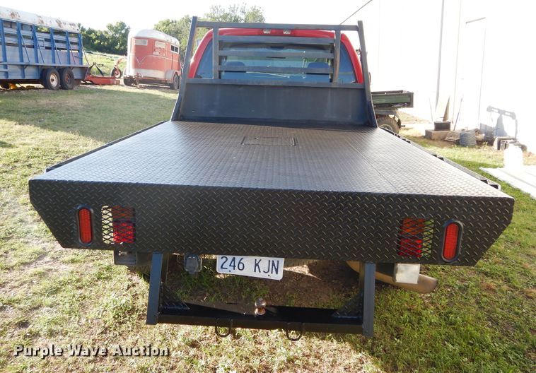 image for item FI9929 2003 Dodge Ram 2500 Quad Cab flatbed pickup truck