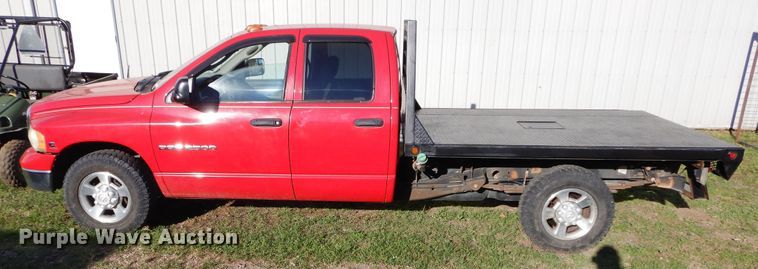 image for item FI9929 2003 Dodge Ram 2500 Quad Cab flatbed pickup truck
