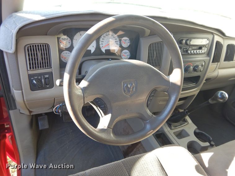 image for item FI9929 2003 Dodge Ram 2500 Quad Cab flatbed pickup truck