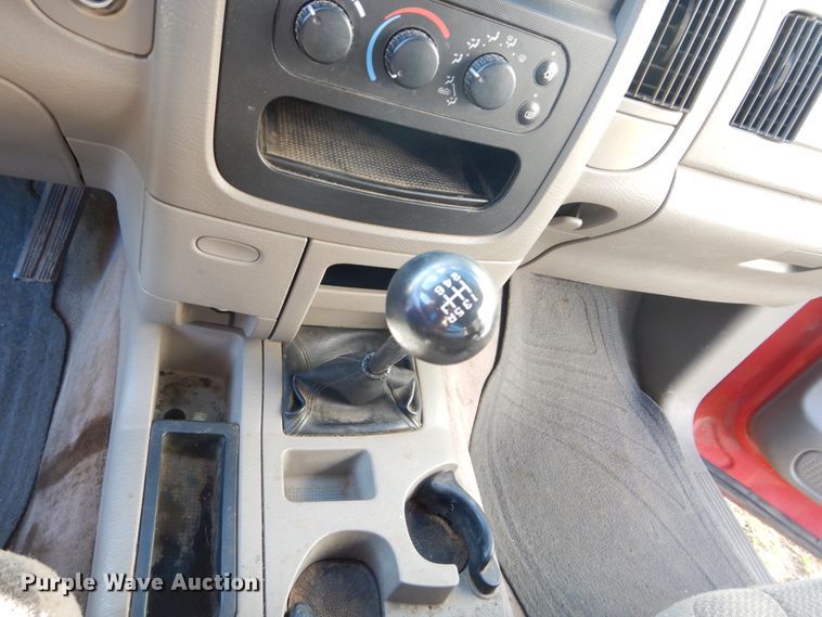 image for item FI9929 2003 Dodge Ram 2500 Quad Cab flatbed pickup truck