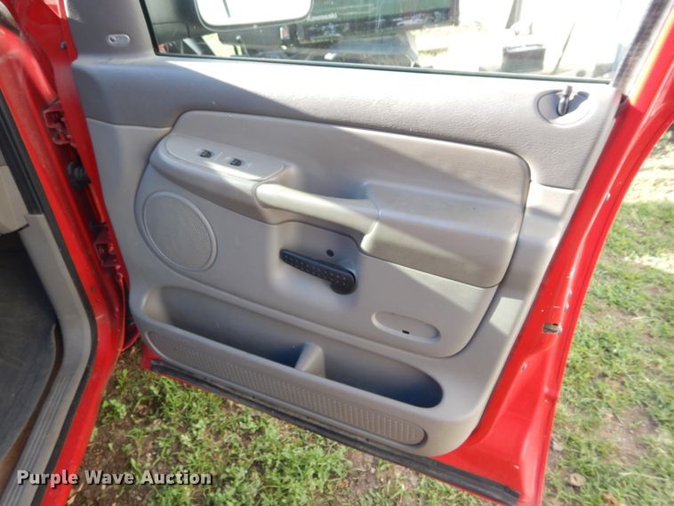 image for item FI9929 2003 Dodge Ram 2500 Quad Cab flatbed pickup truck