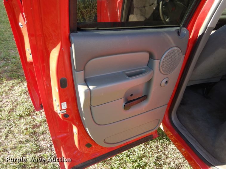 image for item FI9929 2003 Dodge Ram 2500 Quad Cab flatbed pickup truck