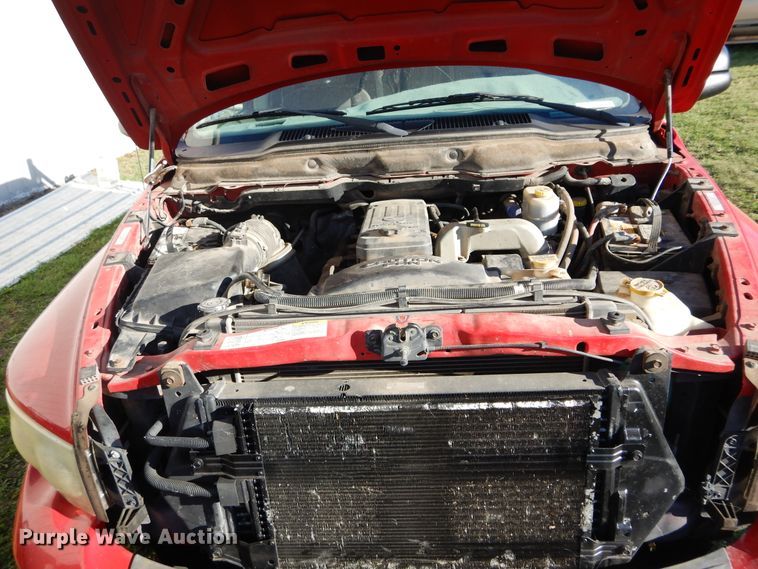 image for item FI9929 2003 Dodge Ram 2500 Quad Cab flatbed pickup truck