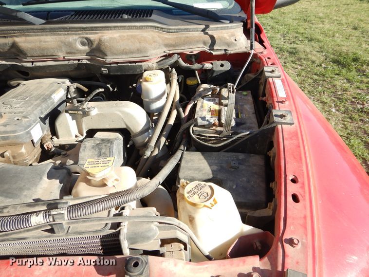 image for item FI9929 2003 Dodge Ram 2500 Quad Cab flatbed pickup truck