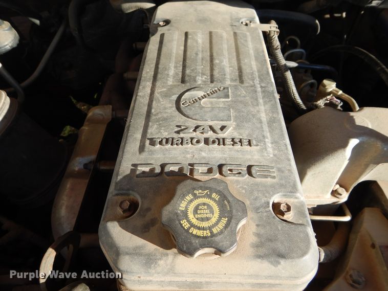 image for item FI9929 2003 Dodge Ram 2500 Quad Cab flatbed pickup truck