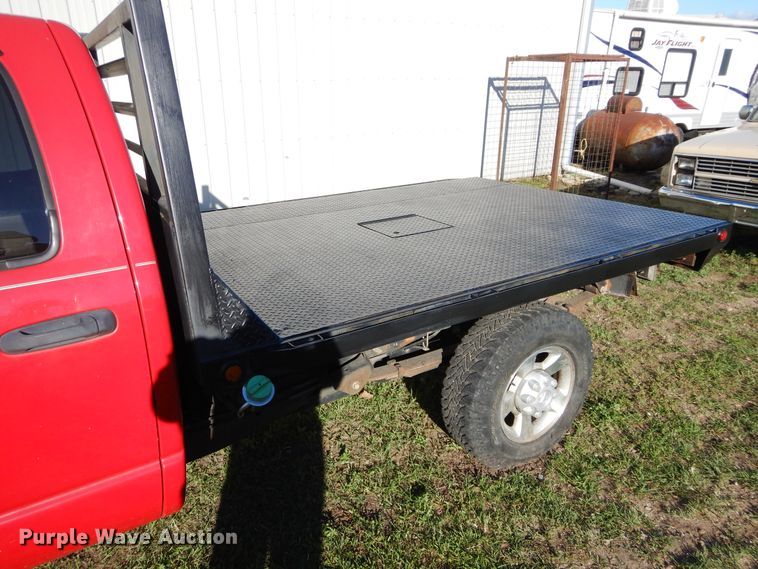 image for item FI9929 2003 Dodge Ram 2500 Quad Cab flatbed pickup truck