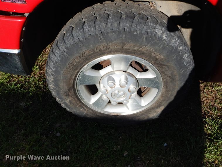 image for item FI9929 2003 Dodge Ram 2500 Quad Cab flatbed pickup truck