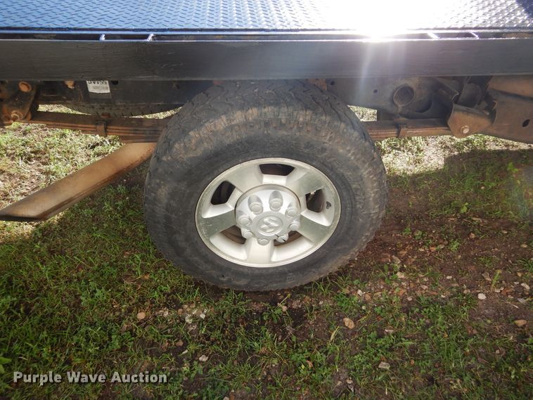 image for item FI9929 2003 Dodge Ram 2500 Quad Cab flatbed pickup truck