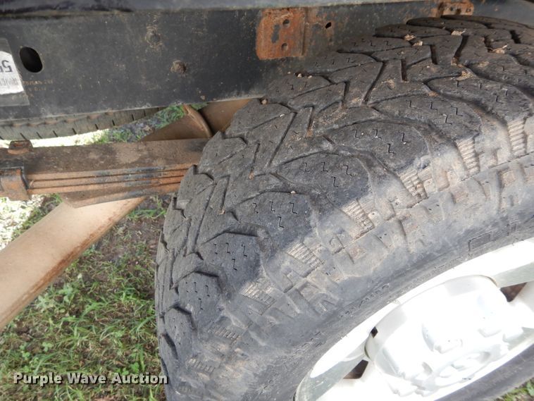 image for item FI9929 2003 Dodge Ram 2500 Quad Cab flatbed pickup truck