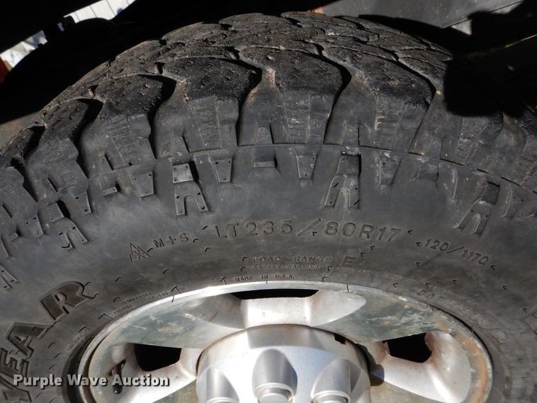 image for item FI9929 2003 Dodge Ram 2500 Quad Cab flatbed pickup truck