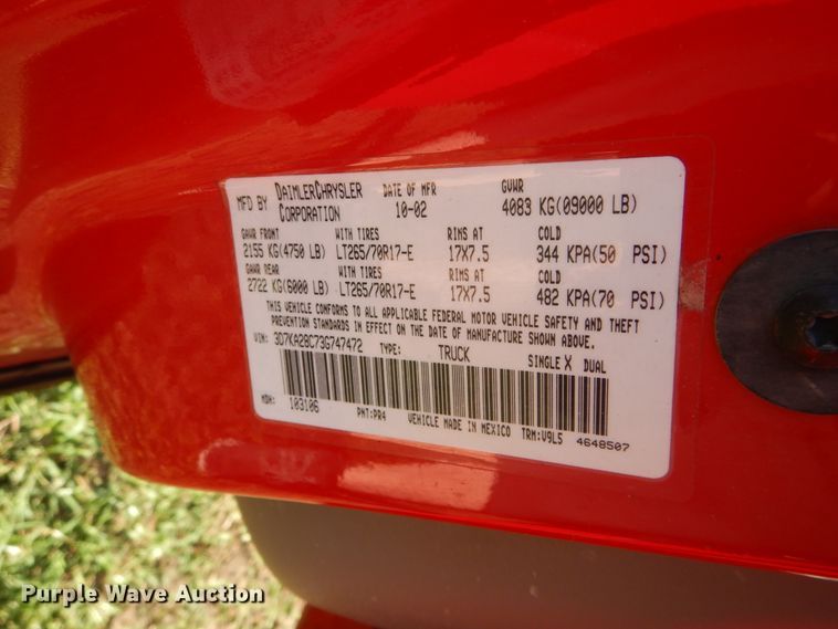 image for item FI9929 2003 Dodge Ram 2500 Quad Cab flatbed pickup truck