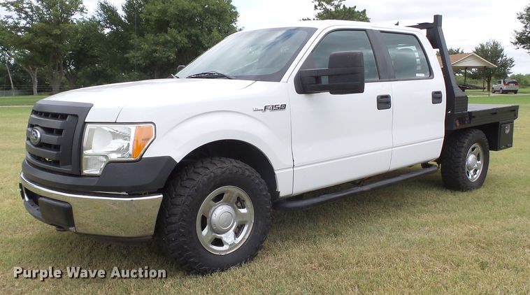 image for item FL9312 2011 Ford F150 SuperCrew flatbed pickup truck
