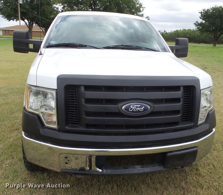 image for item FL9312 2011 Ford F150 SuperCrew flatbed pickup truck