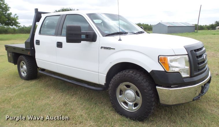 image for item FL9312 2011 Ford F150 SuperCrew flatbed pickup truck