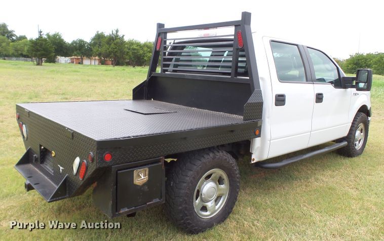 image for item FL9312 2011 Ford F150 SuperCrew flatbed pickup truck