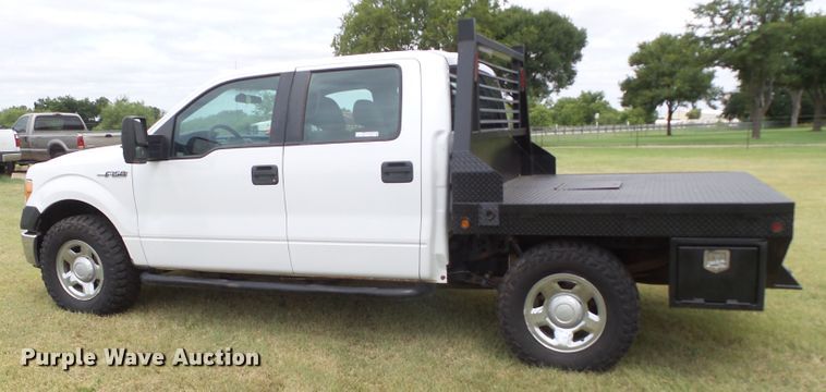 image for item FL9312 2011 Ford F150 SuperCrew flatbed pickup truck
