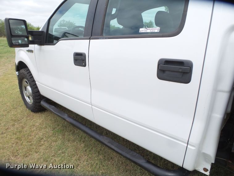 image for item FL9312 2011 Ford F150 SuperCrew flatbed pickup truck