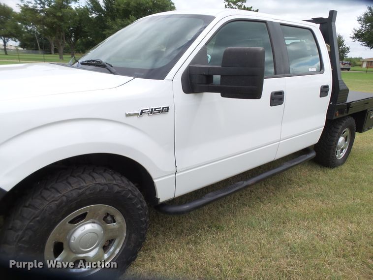image for item FL9312 2011 Ford F150 SuperCrew flatbed pickup truck