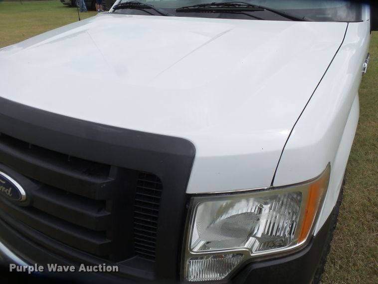 image for item FL9312 2011 Ford F150 SuperCrew flatbed pickup truck