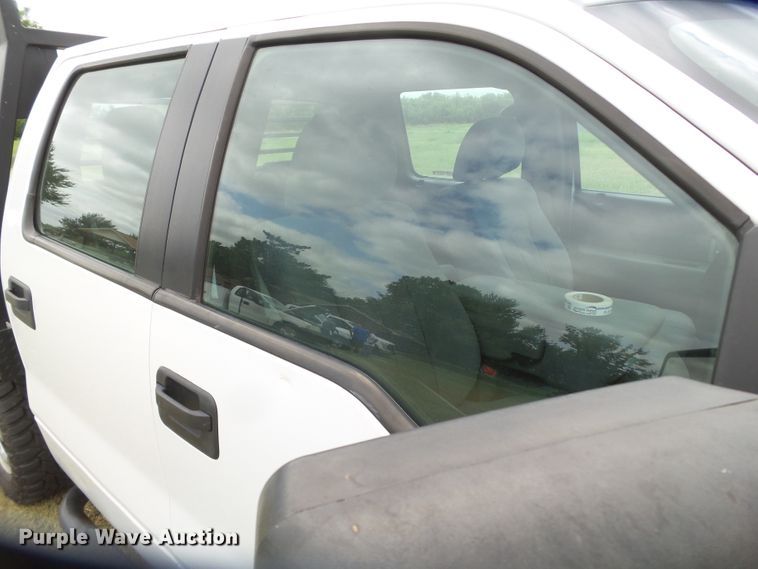 image for item FL9312 2011 Ford F150 SuperCrew flatbed pickup truck