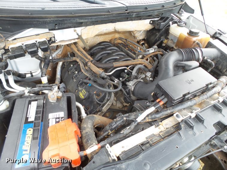 image for item FL9312 2011 Ford F150 SuperCrew flatbed pickup truck