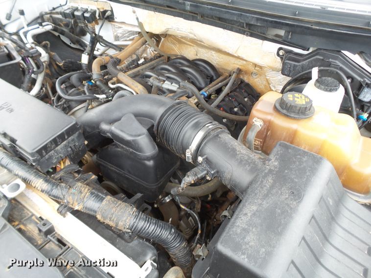 image for item FL9312 2011 Ford F150 SuperCrew flatbed pickup truck