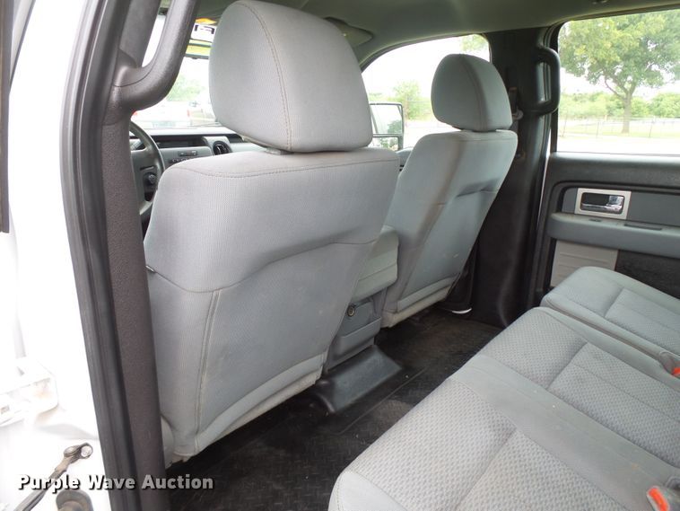 image for item FL9312 2011 Ford F150 SuperCrew flatbed pickup truck