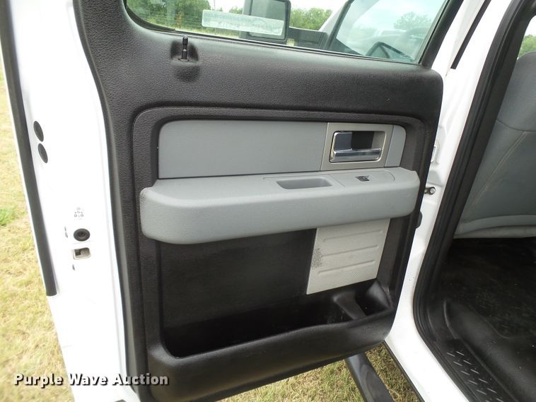 image for item FL9312 2011 Ford F150 SuperCrew flatbed pickup truck