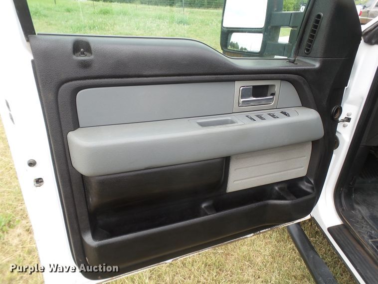 image for item FL9312 2011 Ford F150 SuperCrew flatbed pickup truck