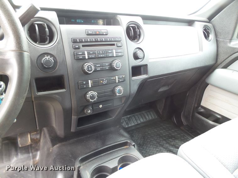 image for item FL9312 2011 Ford F150 SuperCrew flatbed pickup truck