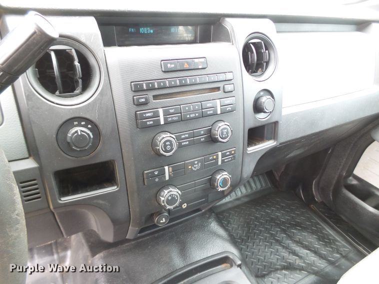 image for item FL9312 2011 Ford F150 SuperCrew flatbed pickup truck