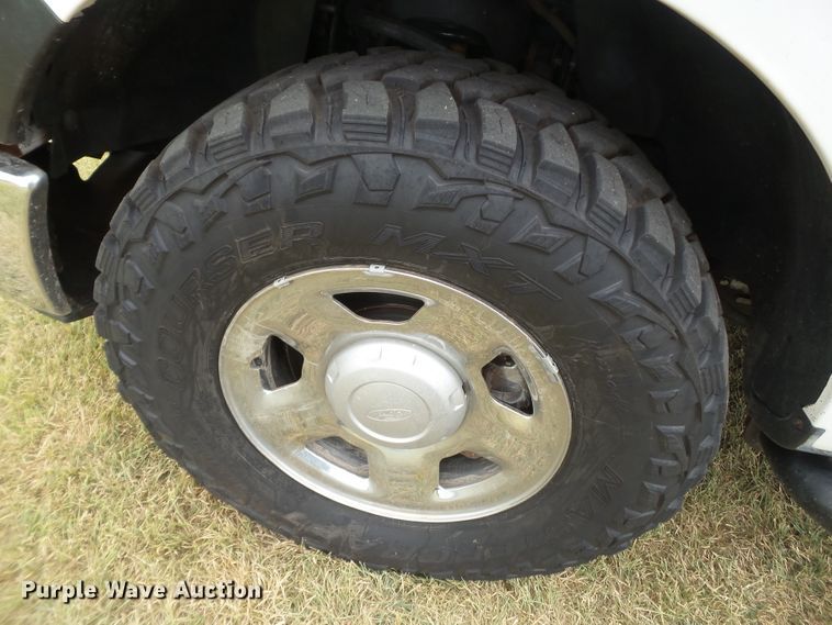 image for item FL9312 2011 Ford F150 SuperCrew flatbed pickup truck