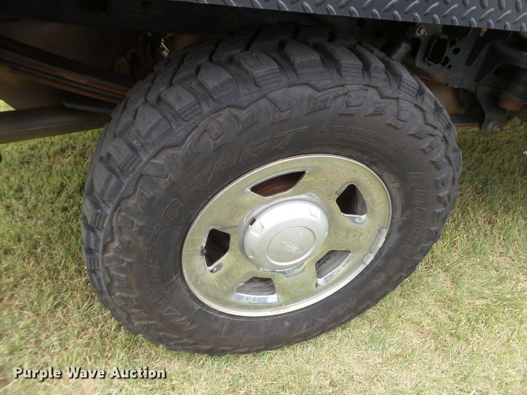 image for item FL9312 2011 Ford F150 SuperCrew flatbed pickup truck