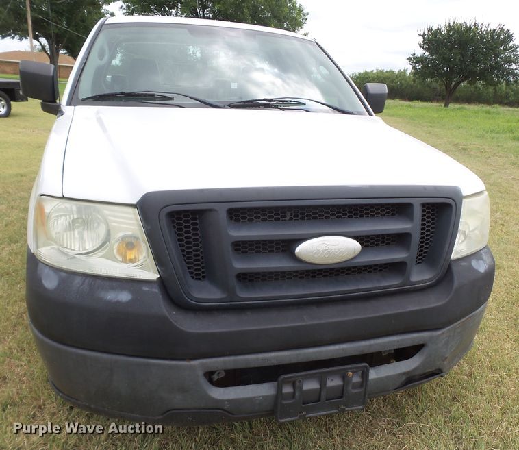 image for item FL9313 2006 Ford F150 utility bed pickup truck