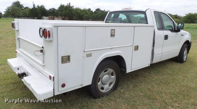 image for item FL9313 2006 Ford F150 utility bed pickup truck