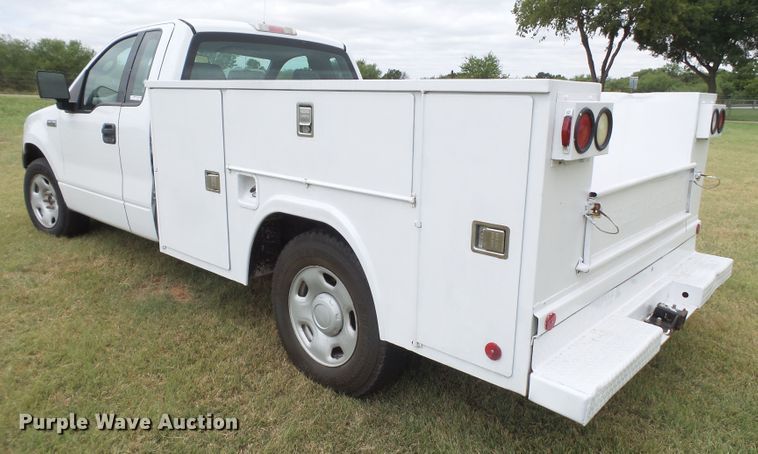 image for item FL9313 2006 Ford F150 utility bed pickup truck